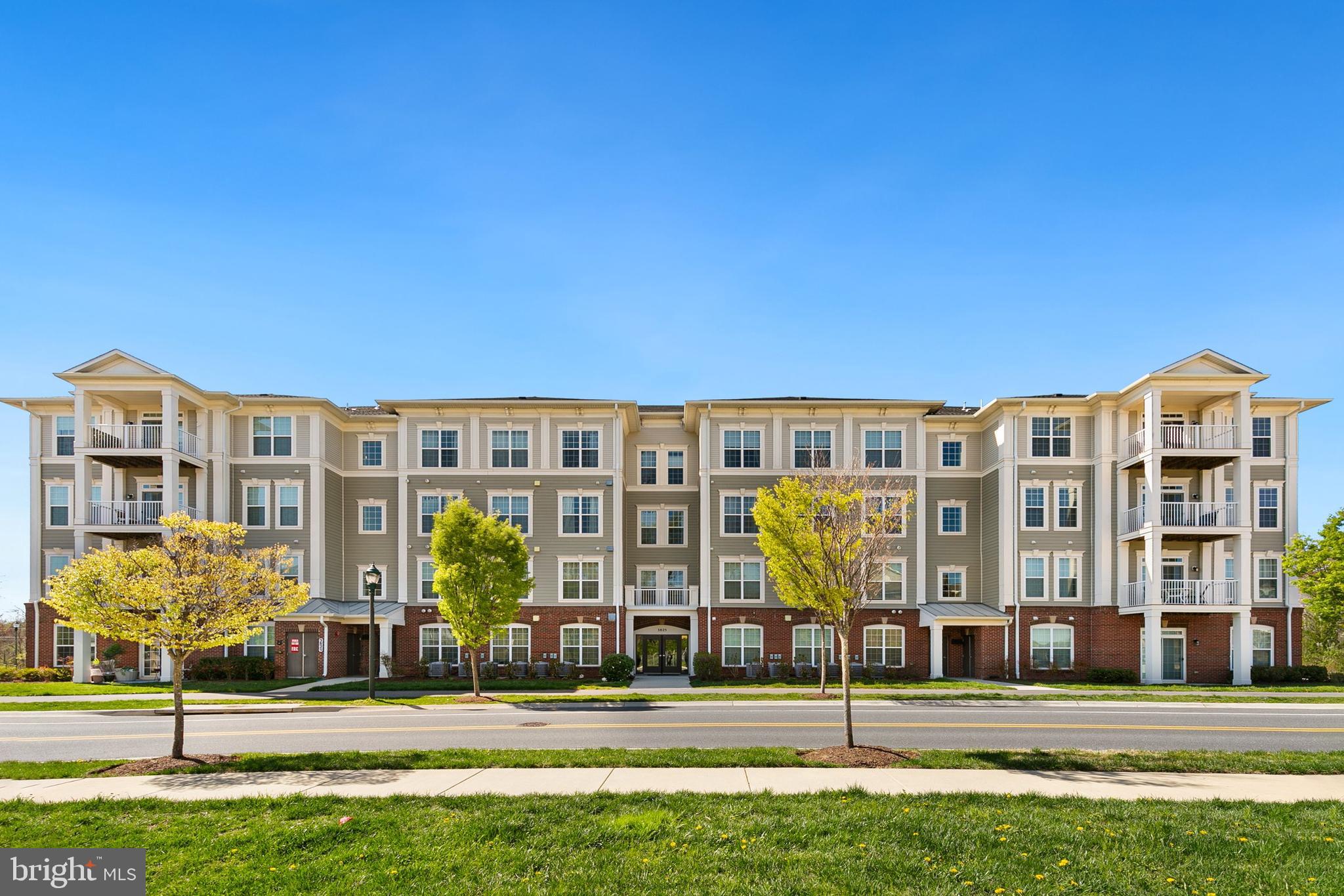 3825 Doc Berlin Drive, Unit 25 Silver Spring, MD 20906 - Photo 40 of 41 a front view of a building with street view