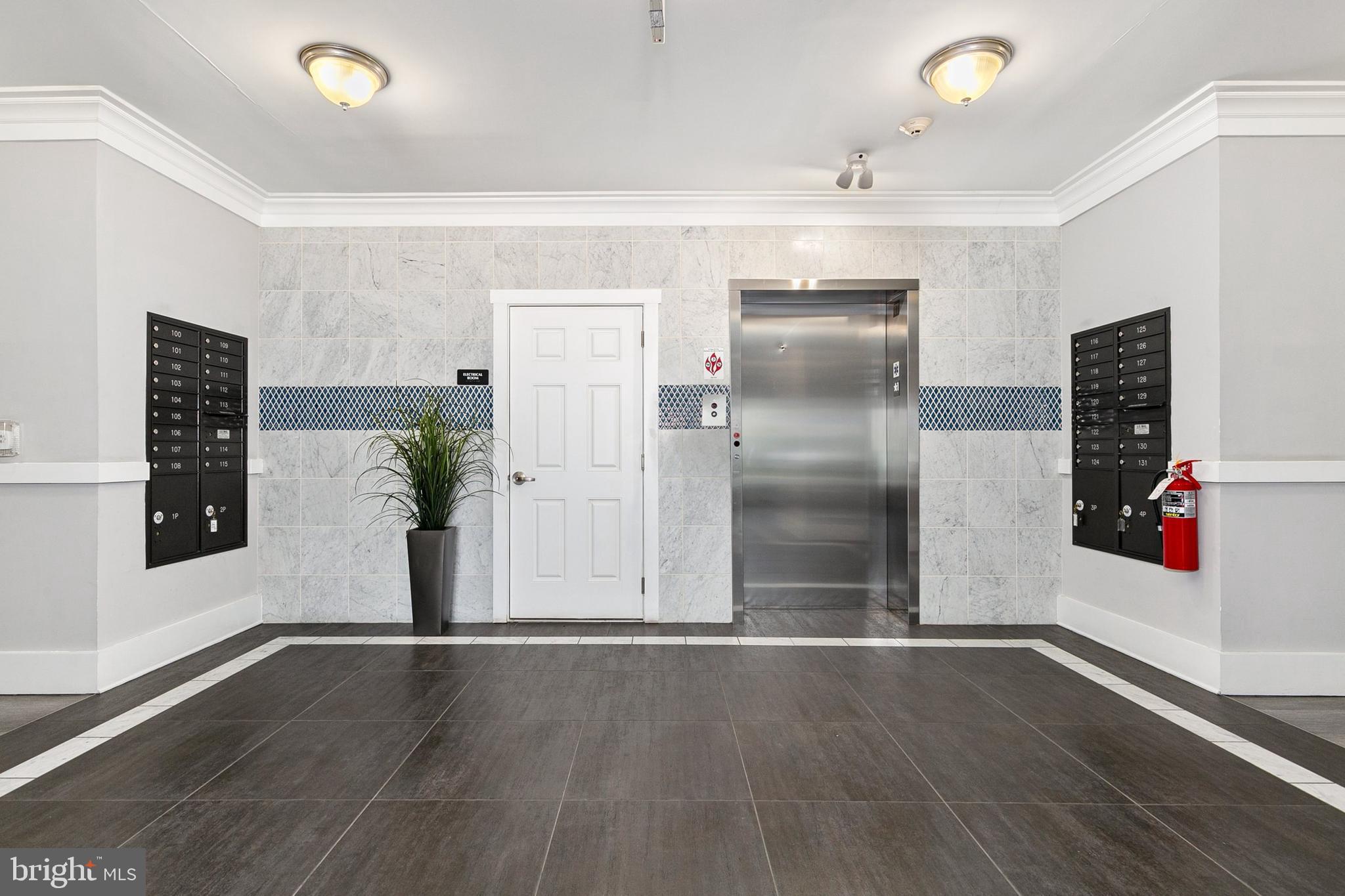 3825 Doc Berlin Drive, Unit 25 Silver Spring, MD 20906 - Photo 4 of 41 a view of a livingroom with wooden floor and staircase