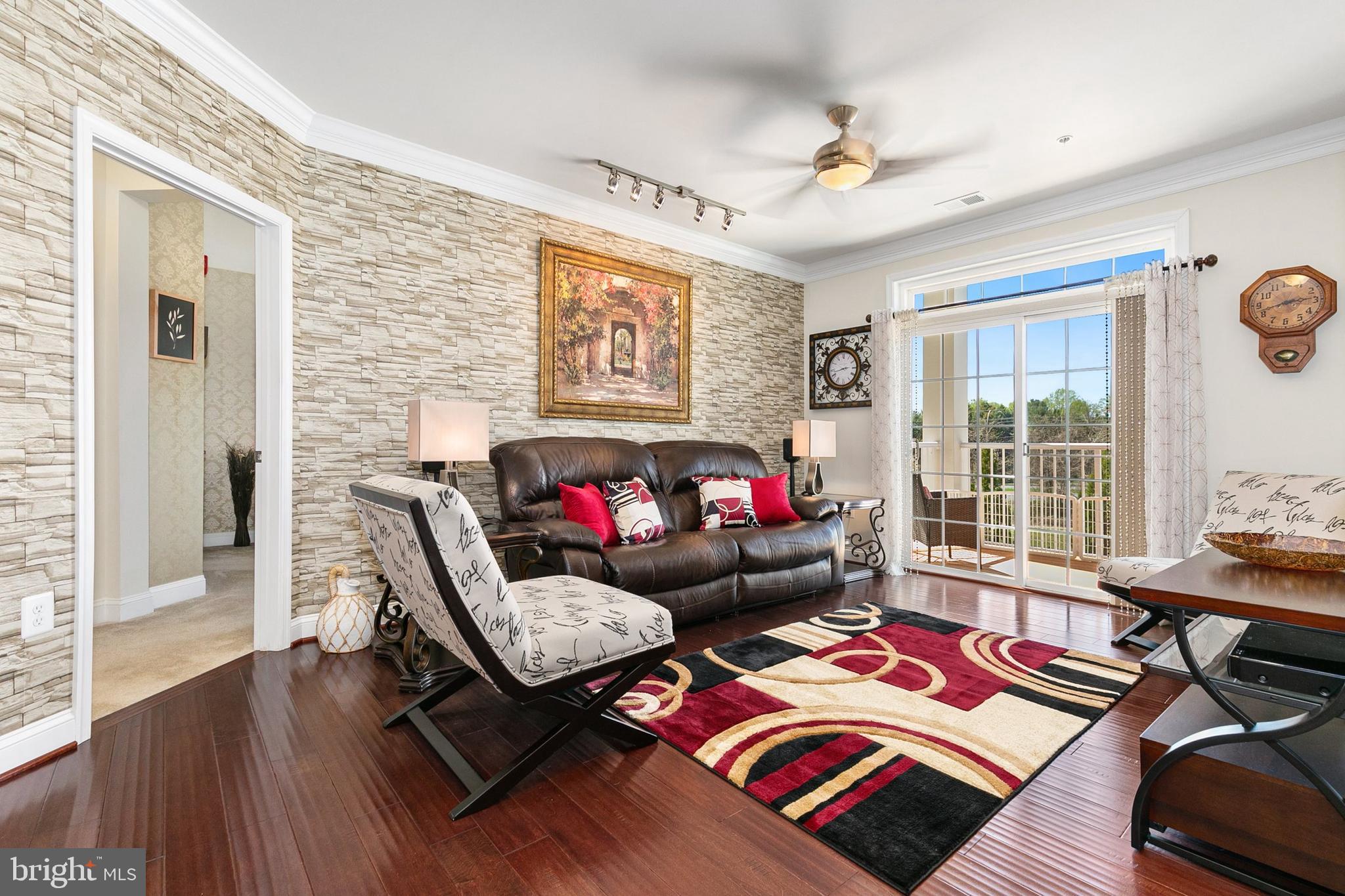 3825 Doc Berlin Drive, Unit 25 Silver Spring, MD 20906 - Photo 5 of 41 a living room with furniture and a window
