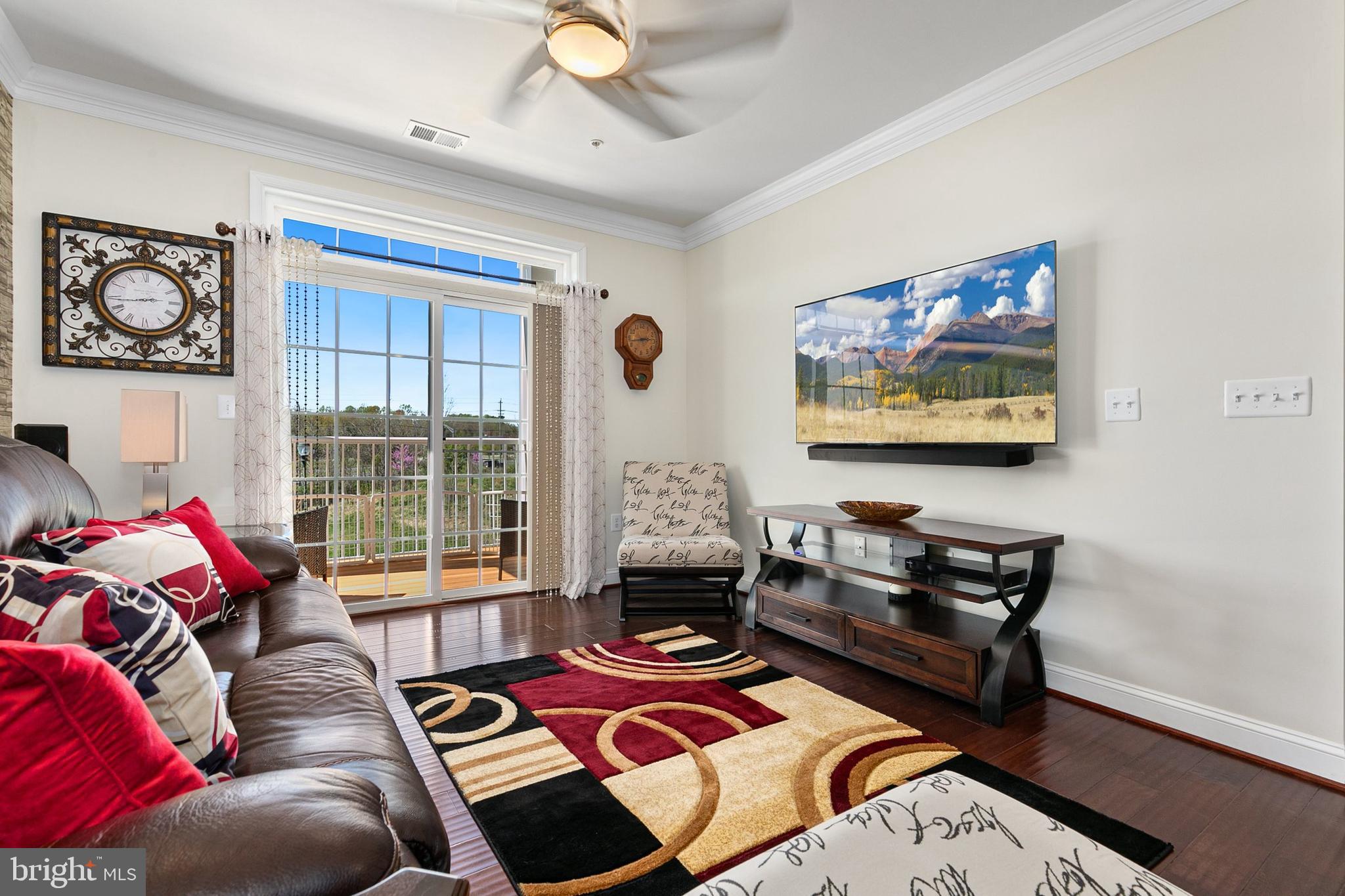 3825 Doc Berlin Drive, Unit 25 Silver Spring, MD 20906 - Photo 6 of 41 a living room with furniture and a window