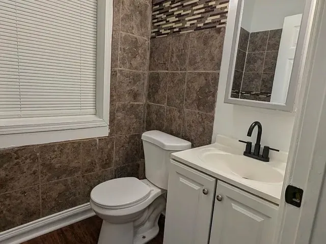 a bathroom with a sink and a toilet
