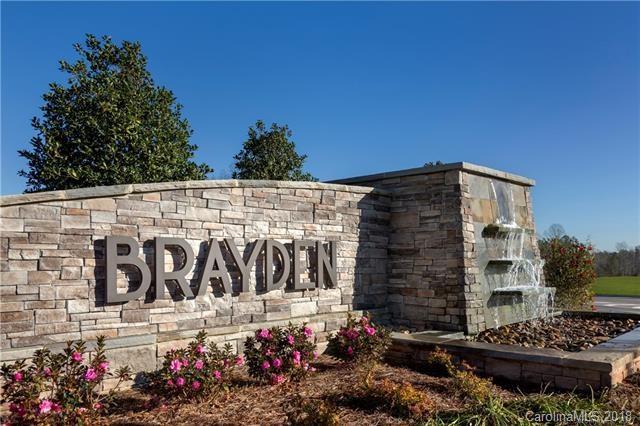 1507 Afton Way, Unit 201 Fort Mill, SC 29708 - Photo 1 of 1 a street sign on a brick wall