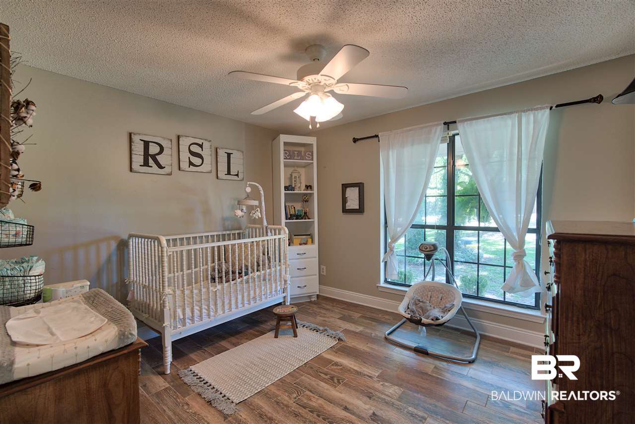 22201 Price Grubbs Road Robertsdale, AL 36567 - Photo 25 of 43 Guest Bedroom