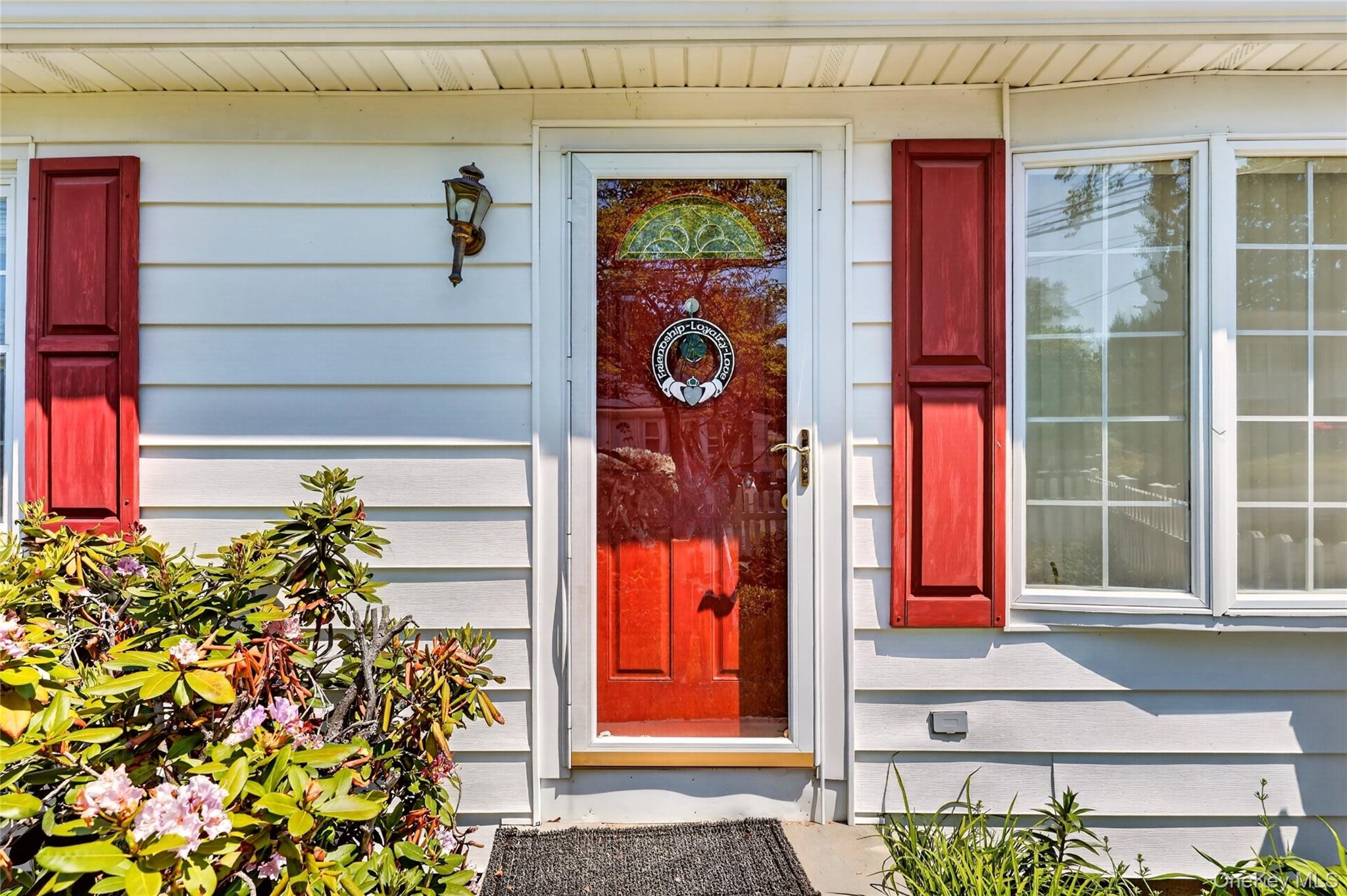 232 Cherry Road Yorktown Heights, NY 10598 - Photo 3 of 21 a front view of a house with a potted plant