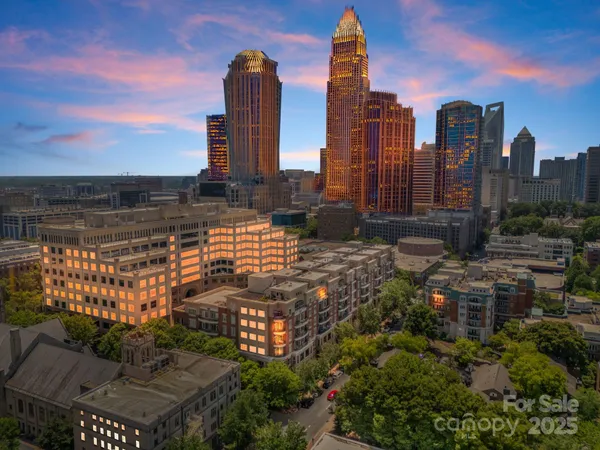 a view of a city with tall buildings