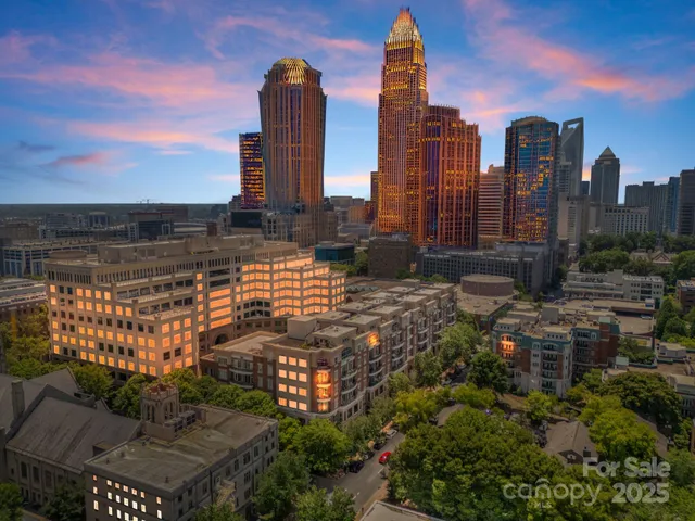 a view of a city with tall buildings
