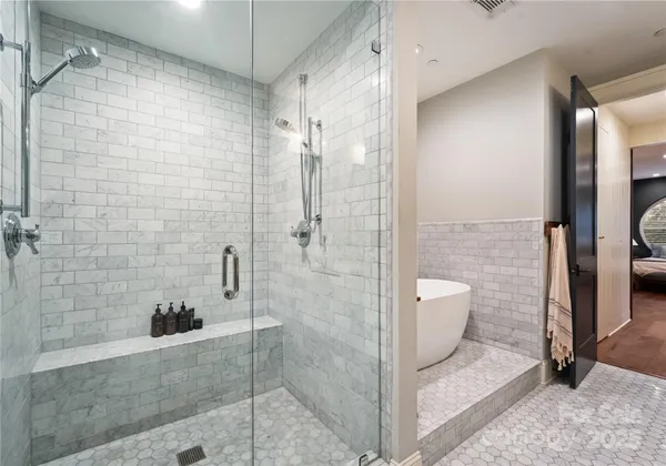 a white bath tub sitting in a bathroom