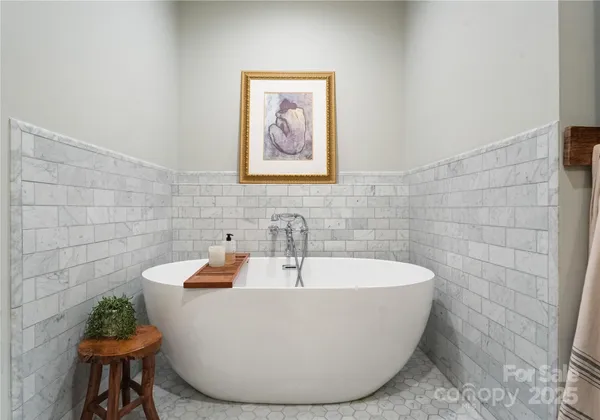 a bathroom with a sink double vanity and a mirror