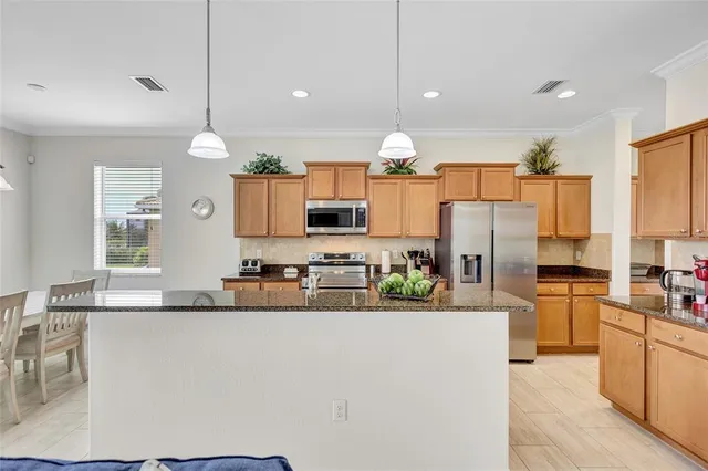 a bedroom with a bed and a cabinets