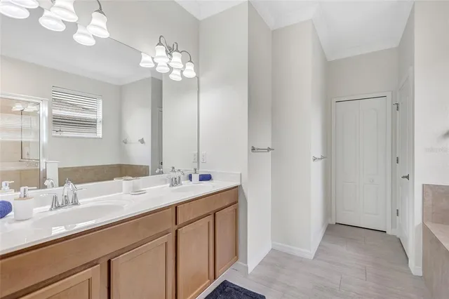 a bathroom with a bathtub and a toilet