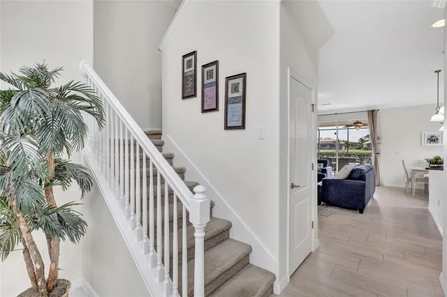 a bedroom with a bed and chair