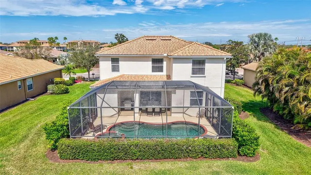 a view of a swimming pool with a porch