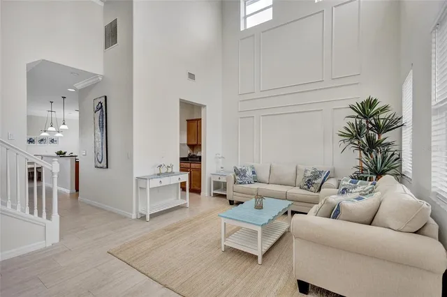 a living room with furniture and a view of living room