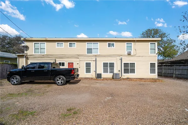 a car parked in front of a house