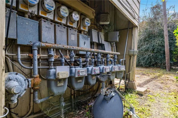 a view of a chairs and table in the patio