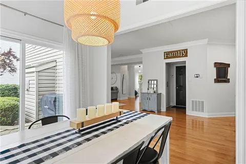 a living room with furniture and a table