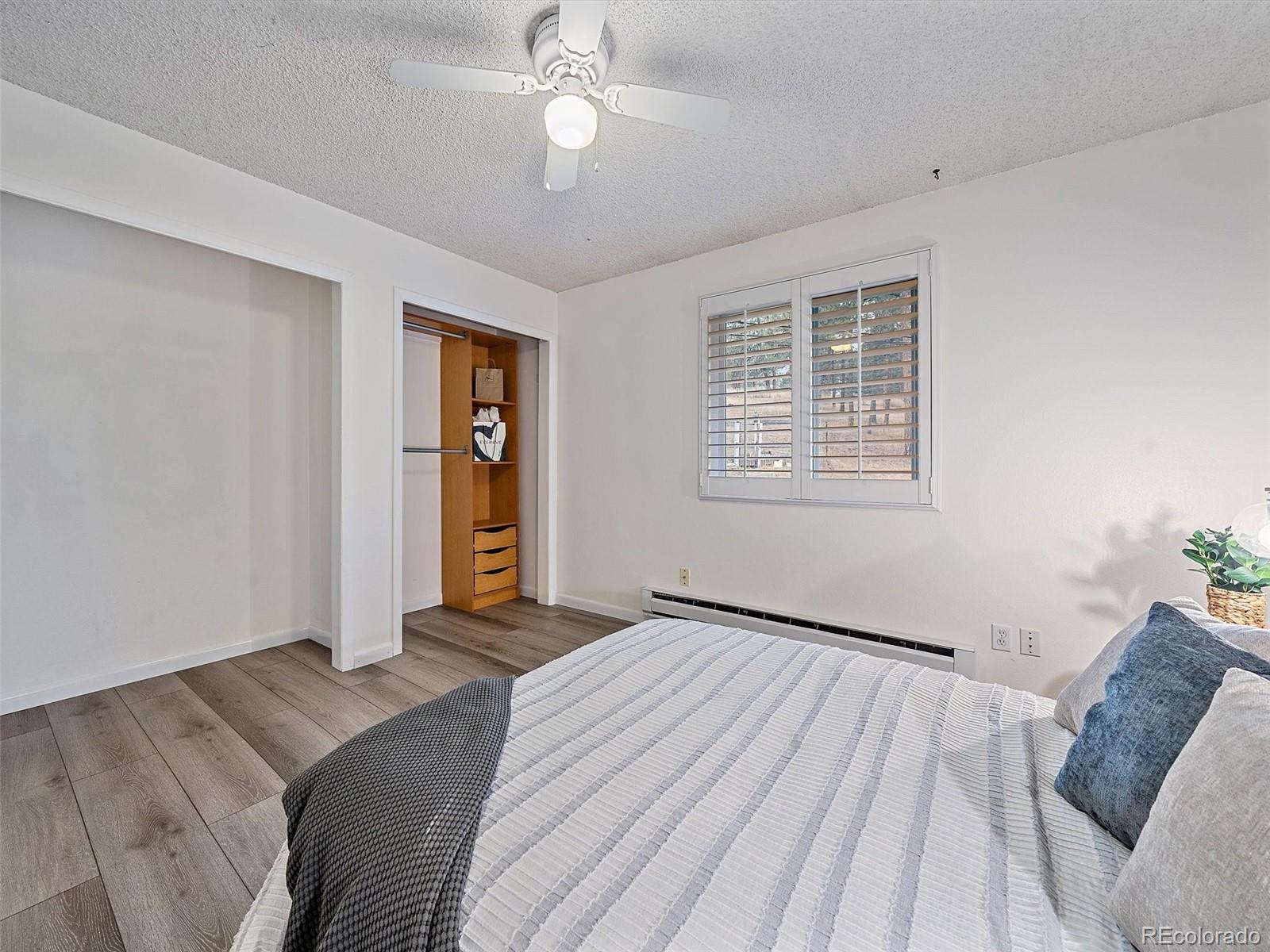 27422 Pine Valley Drive Evergreen, CO 80439 - Photo 20 of 42 a bedroom with a bed and a window