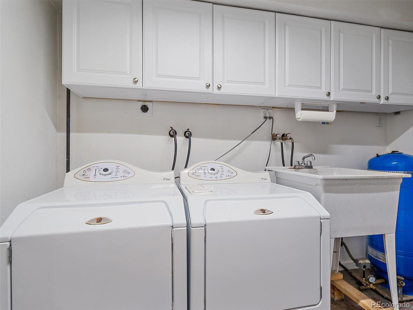 27422 Pine Valley Drive Evergreen, CO 80439 - Photo 27 of 42 a utility room with dryer and washer