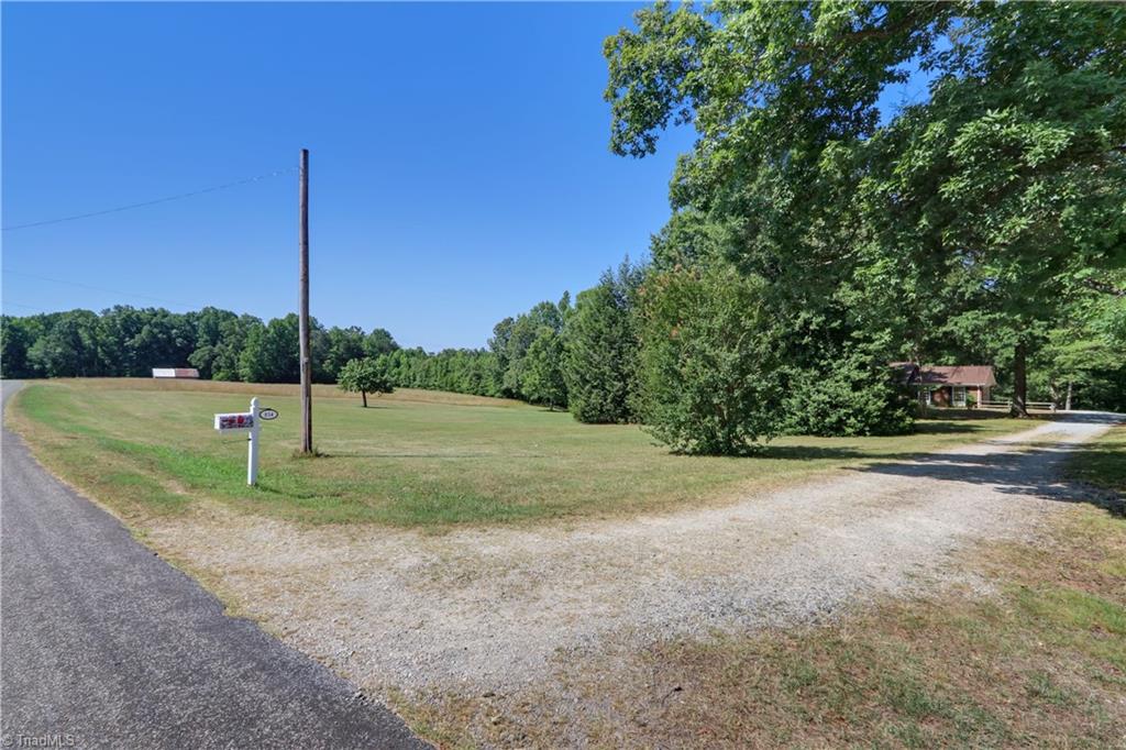 154 Sigmon Road Pelham, NC 27311 - Photo 3 of 43 Front yard and Driveway