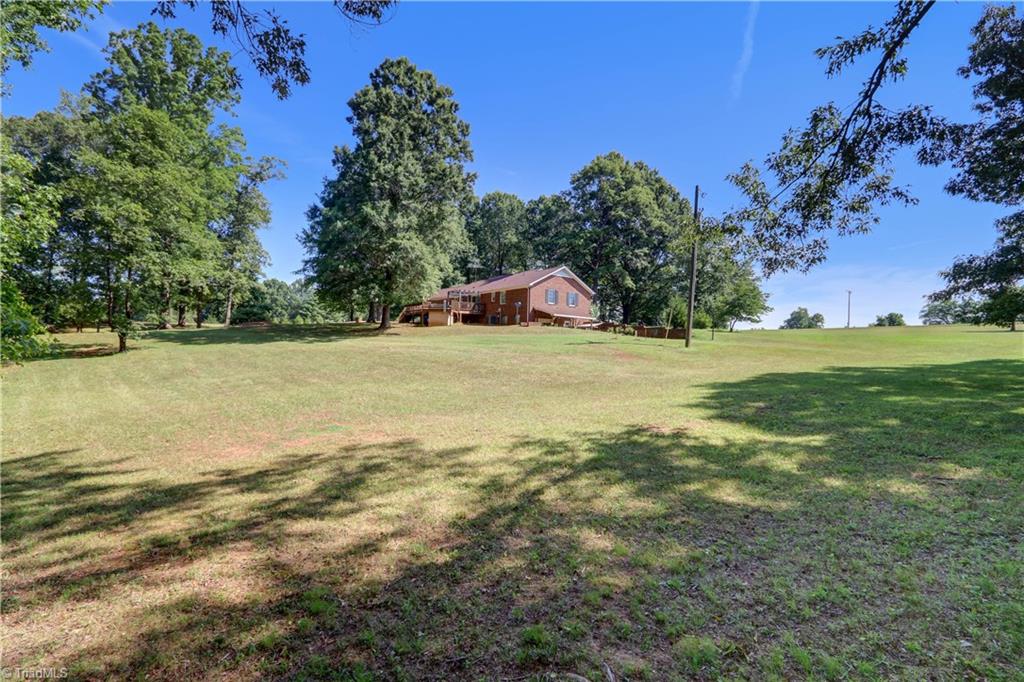 154 Sigmon Road Pelham, NC 27311 - Photo 31 of 43 Backyard