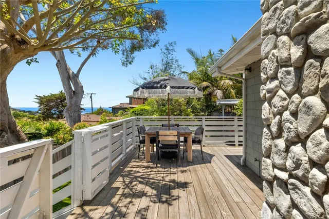 a view of balcony with furniture