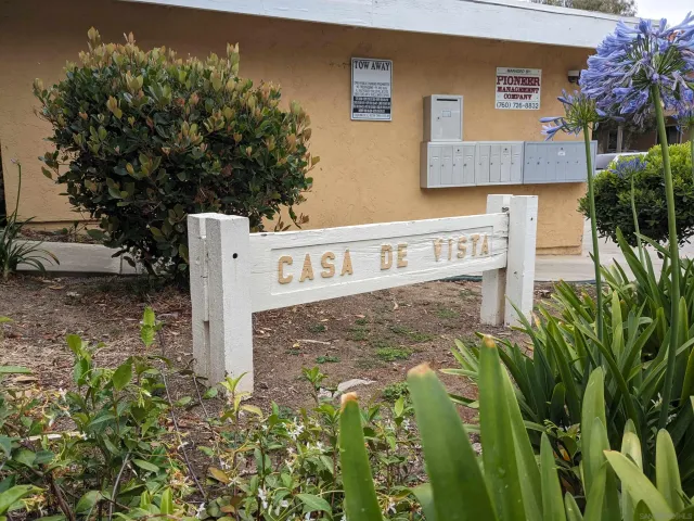 a sign that is on the side of a road