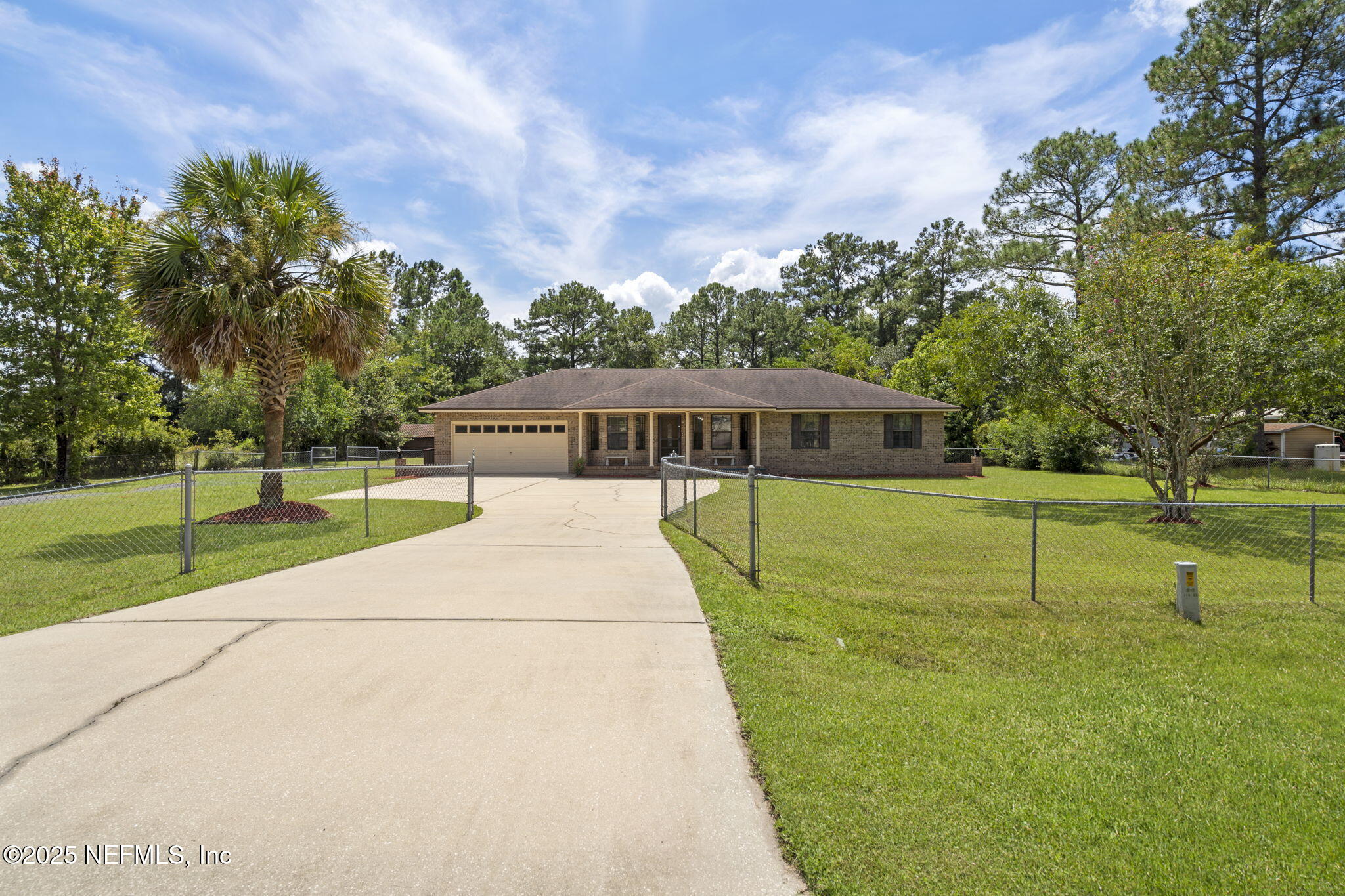 54230 Heller Road Callahan, FL 32011 - Photo 2 of 37 a view of a house with a big yard