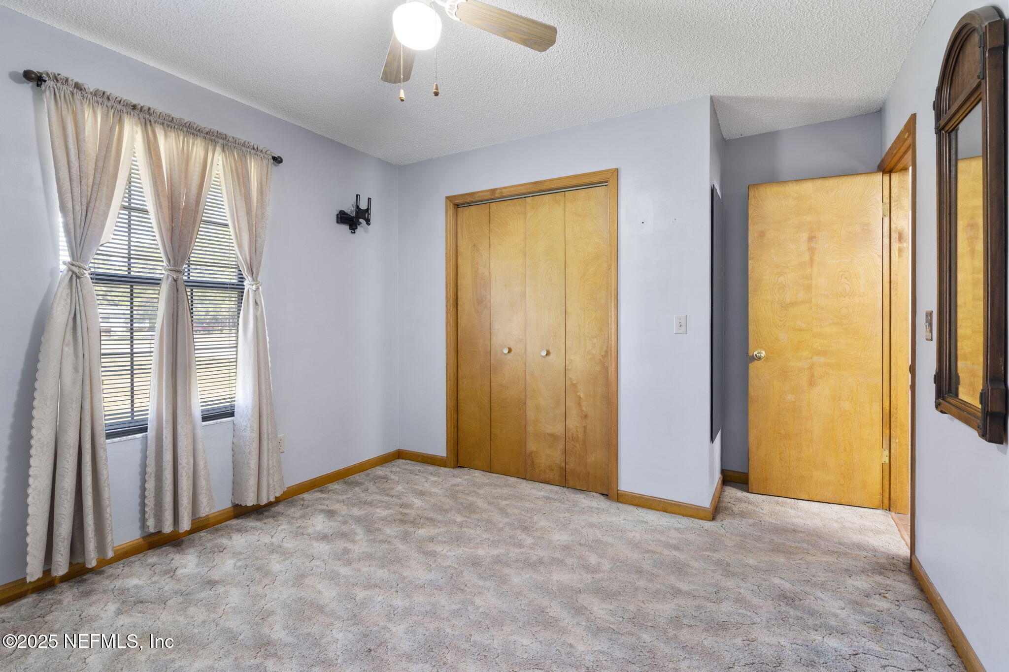 54230 Heller Road Callahan, FL 32011 - Photo 21 of 37 a view of an empty room with a window