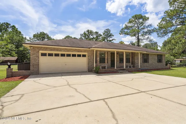 front view of a house with a street