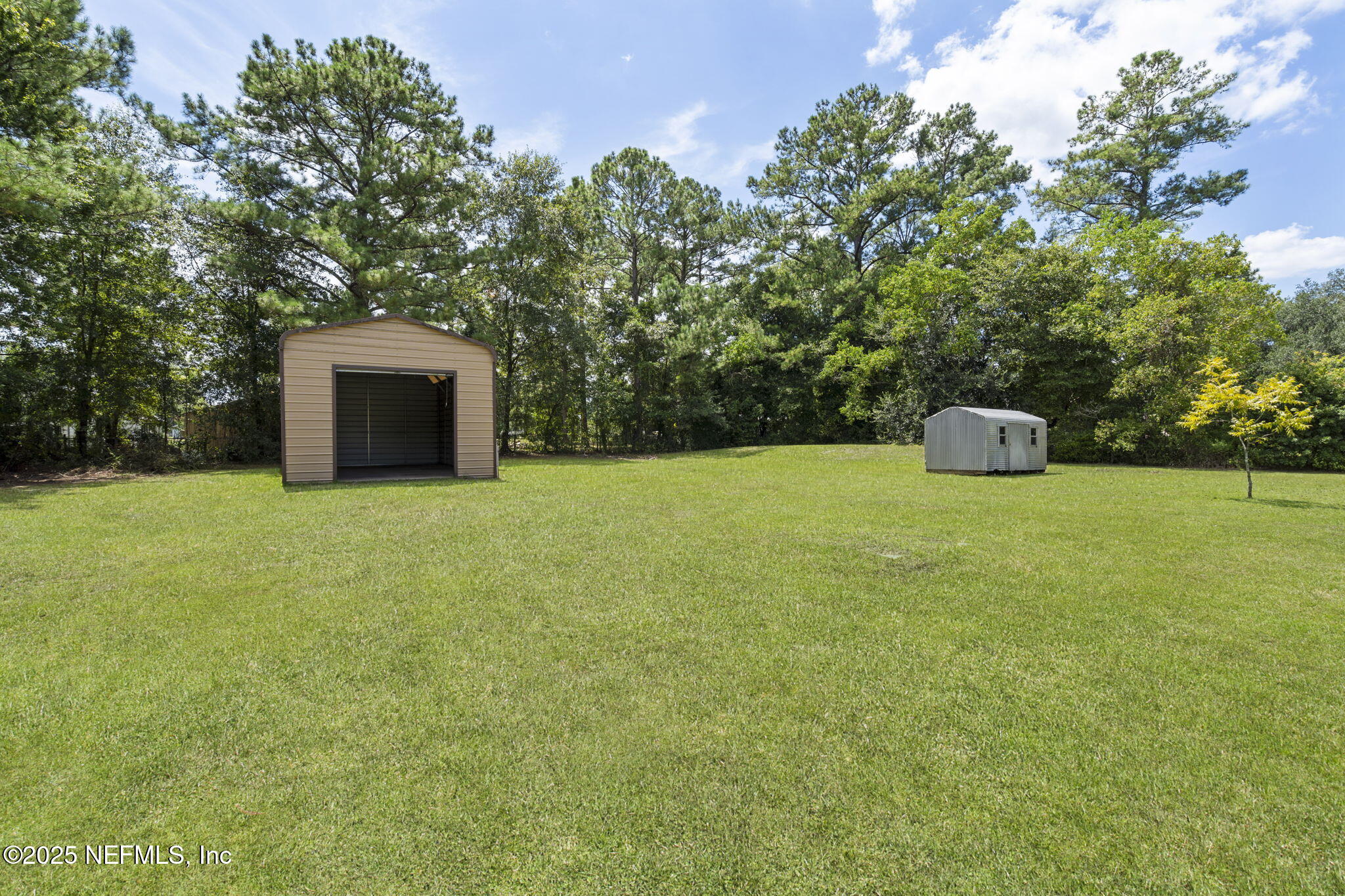 54230 Heller Road Callahan, FL 32011 - Photo 32 of 37 a view of a outdoor space and a yard