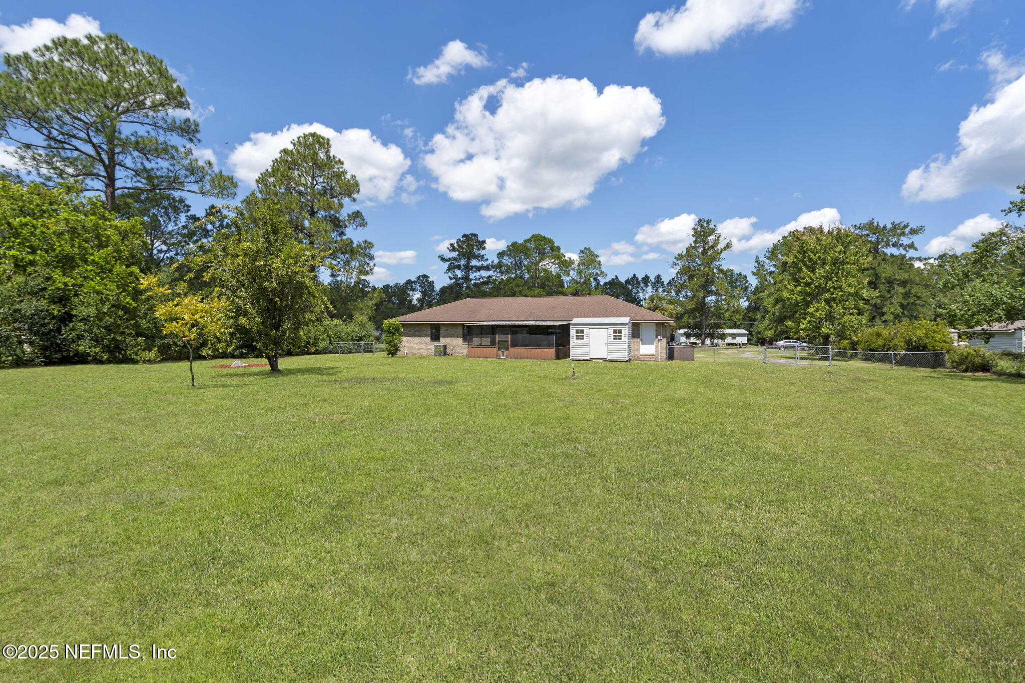 54230 Heller Road Callahan, FL 32011 - Photo 35 of 37 a front view of a house with garden