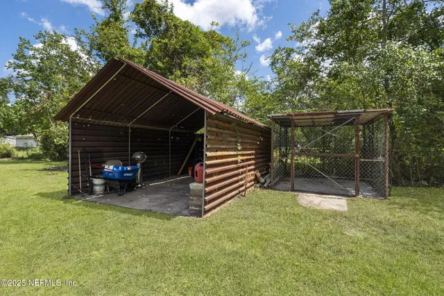 a view of outdoor space and yard