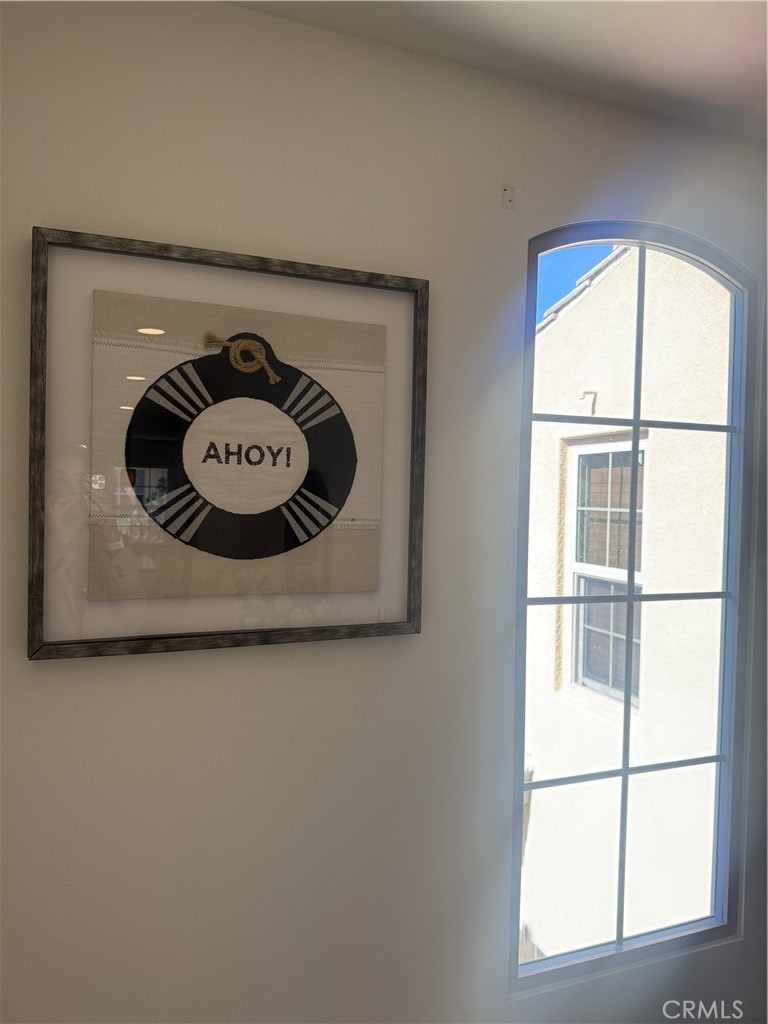 87 Evening Sun Irvine, CA 92620 - Photo 15 of 29 a close up of a wall with a large window