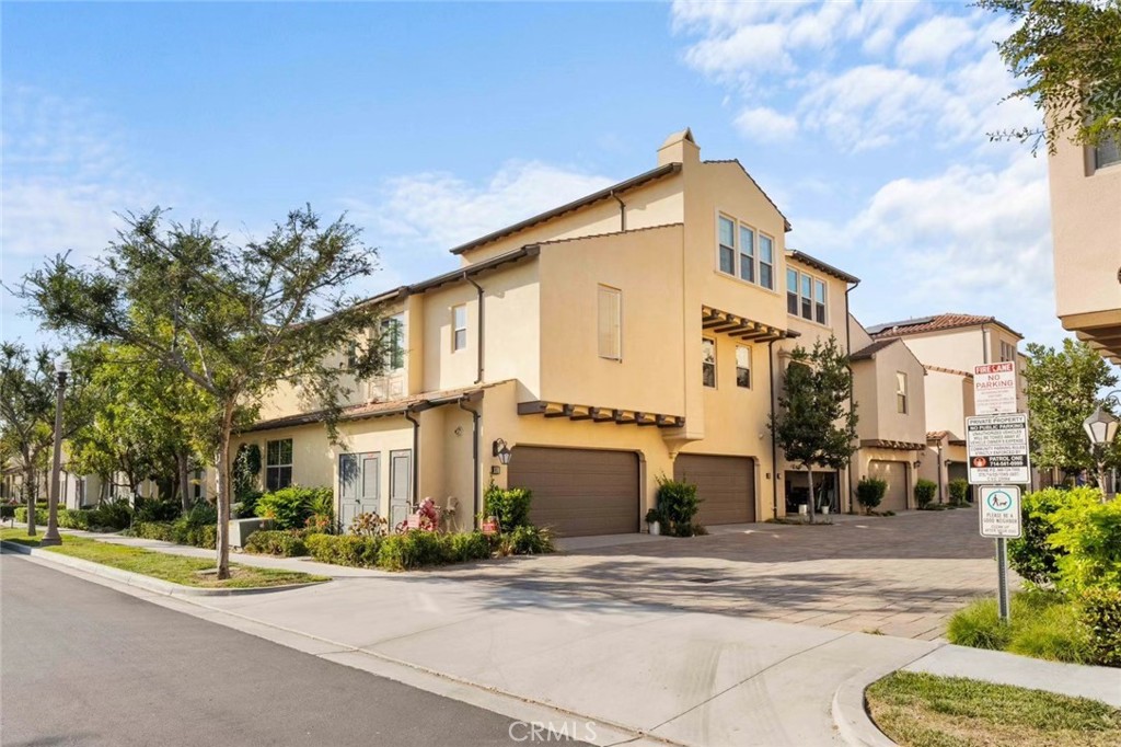 87 Evening Sun Irvine, CA 92620 - Photo 2 of 29 a view of a house with a street