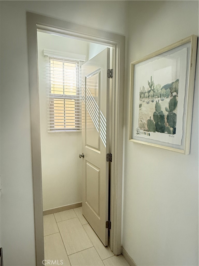 87 Evening Sun Irvine, CA 92620 - Photo 21 of 29 an empty room with windows and closet