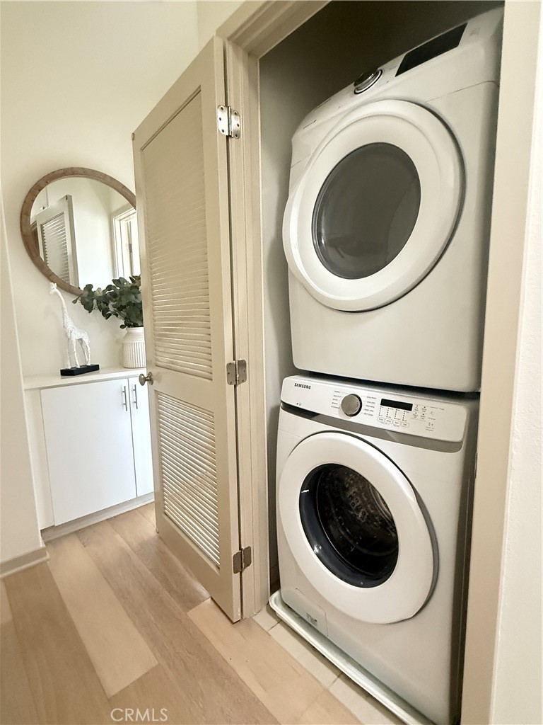 87 Evening Sun Irvine, CA 92620 - Photo 28 of 29 a utility room with dryer and washer