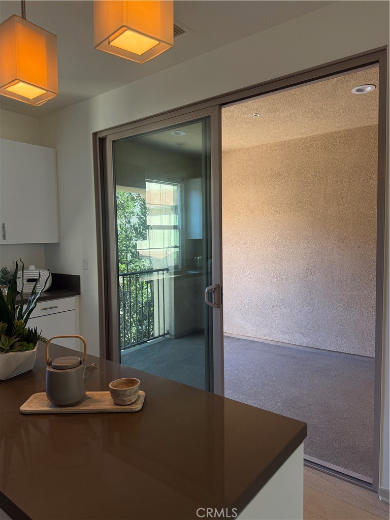 87 Evening Sun Irvine, CA 92620 - Photo 29 of 29 a view of a door and chair in a room