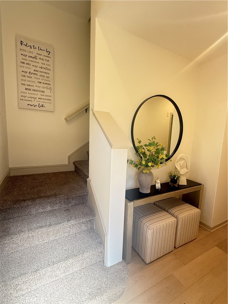 87 Evening Sun Irvine, CA 92620 - Photo 4 of 29 a living room with a couch and a table
