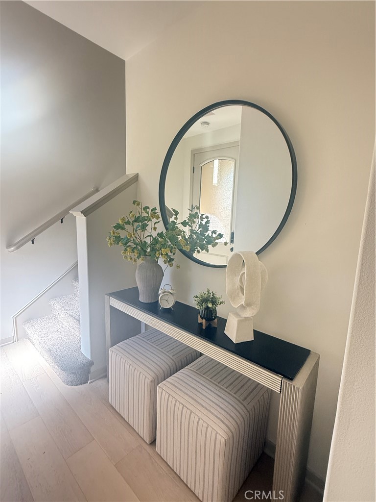 87 Evening Sun Irvine, CA 92620 - Photo 7 of 29 a room with a bed and a mirror