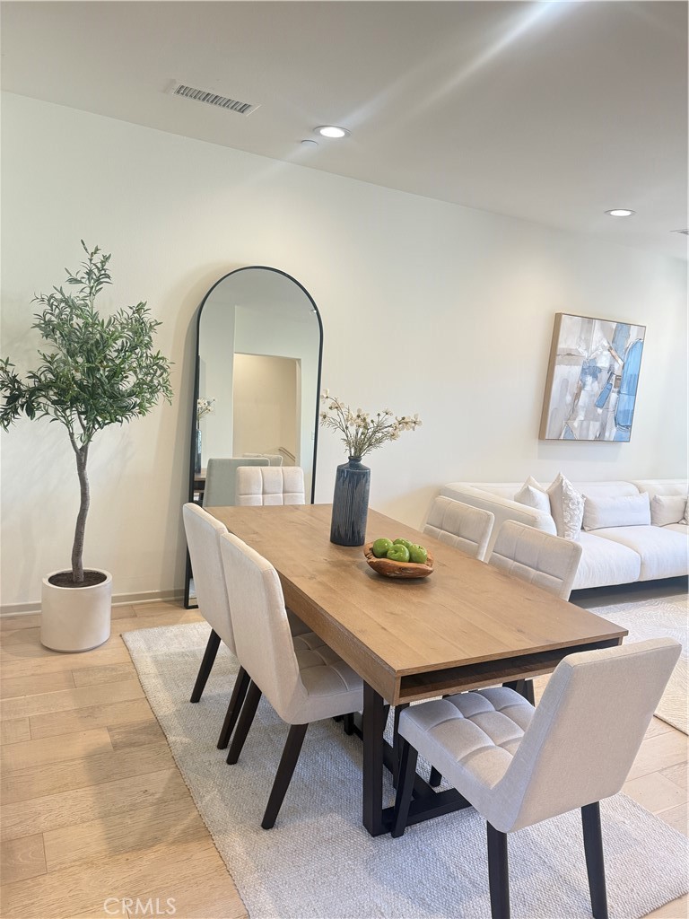 87 Evening Sun Irvine, CA 92620 - Photo 9 of 29 a view of a livingroom with furniture and a table