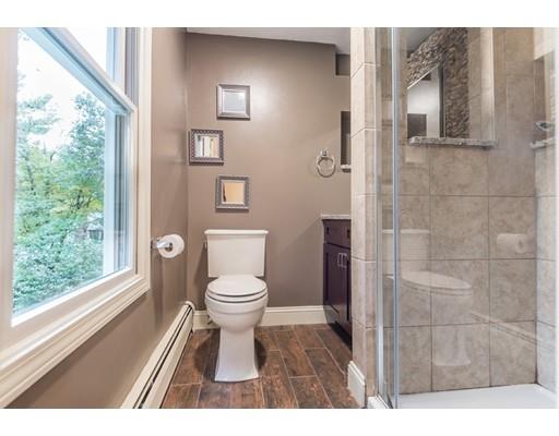 119 Rattlesnake Hill Road Andover, MA 01810 - Photo 25 of 30 a bathroom with a toilet a sink and a window