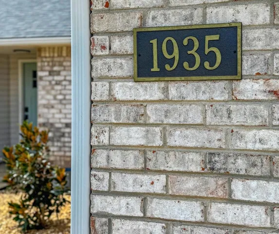 a sign that is on the side of a building