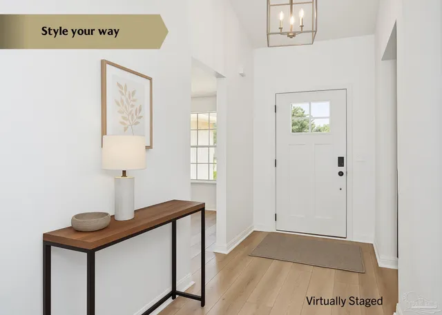 a view of hall way with furniture