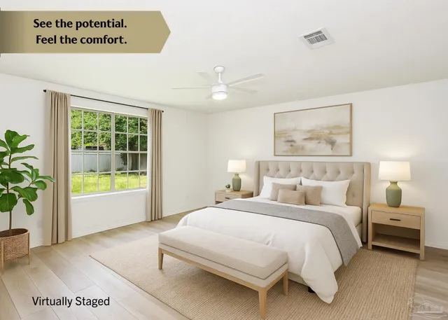 a spacious bedroom with a large bed and a window