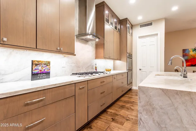 a living room with a bed furniture and a window