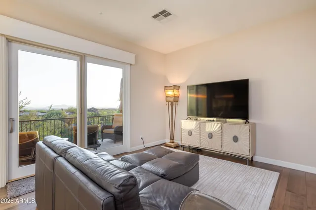 a spacious bathroom with a double vanity sink a mirror and a shower