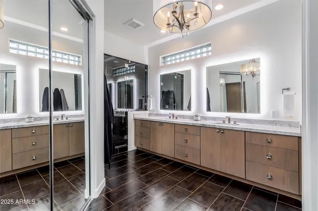 a spacious bathroom with a sink double vanity