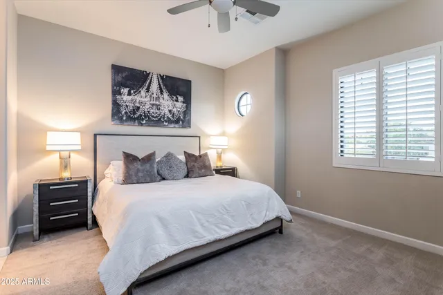 a swimming pool with outdoor seating and yard