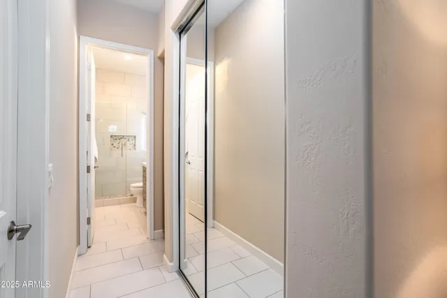 a view of a house with backyard porch and sitting area