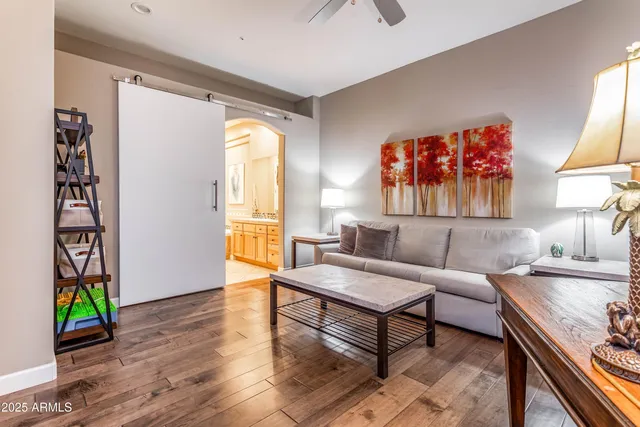 a view of swimming pool with outdoor seating and plants